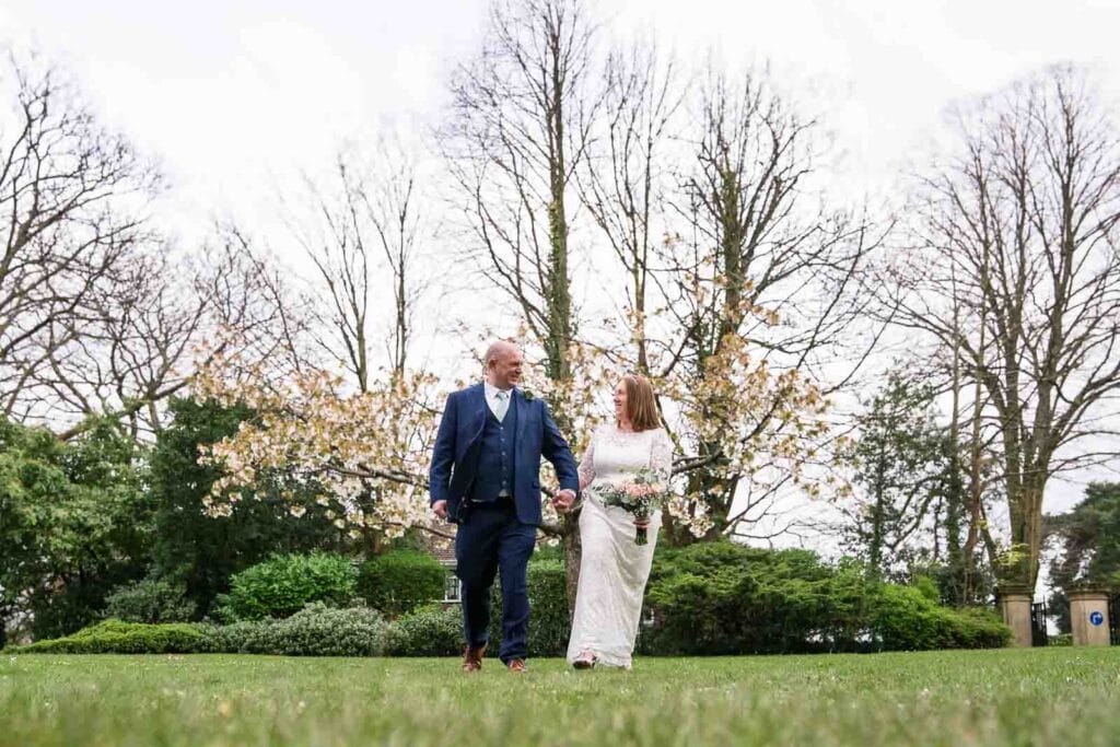 Couple portraits in the gardens of Mansion House registry office wedding, photographed by Newport wedding photographer.