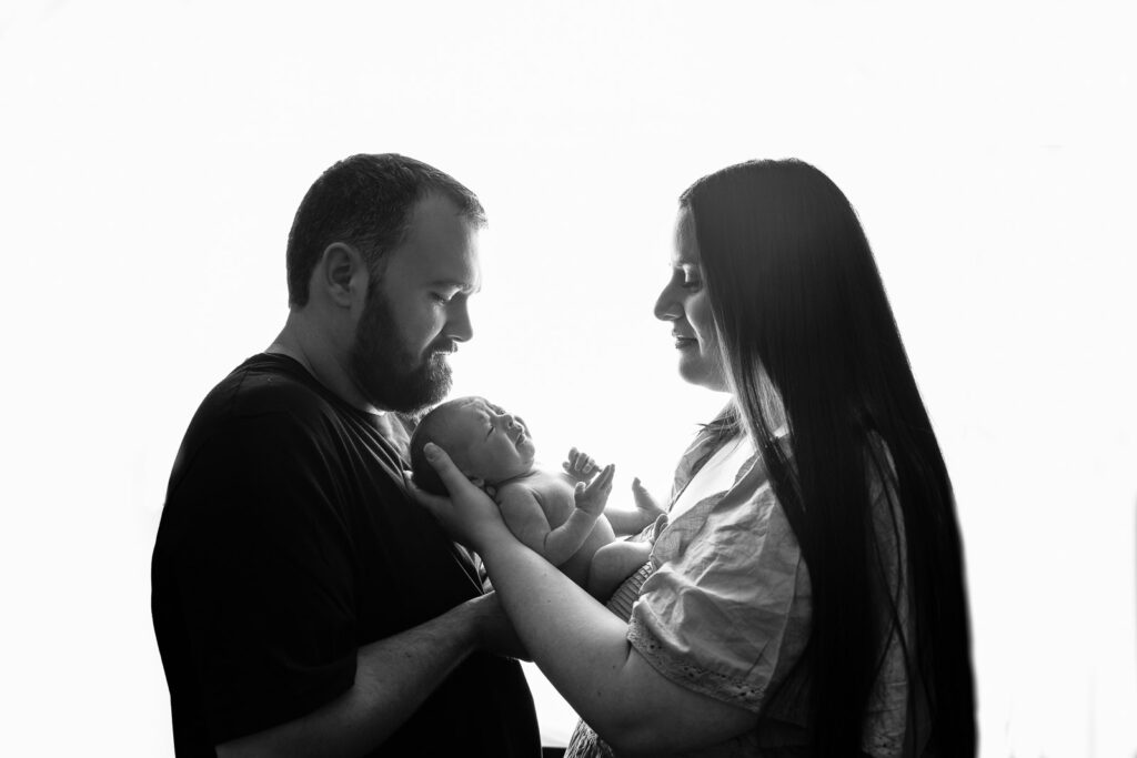 Newborn family portrait, grey backdrop, Vale of Glamorgan Baby Photography