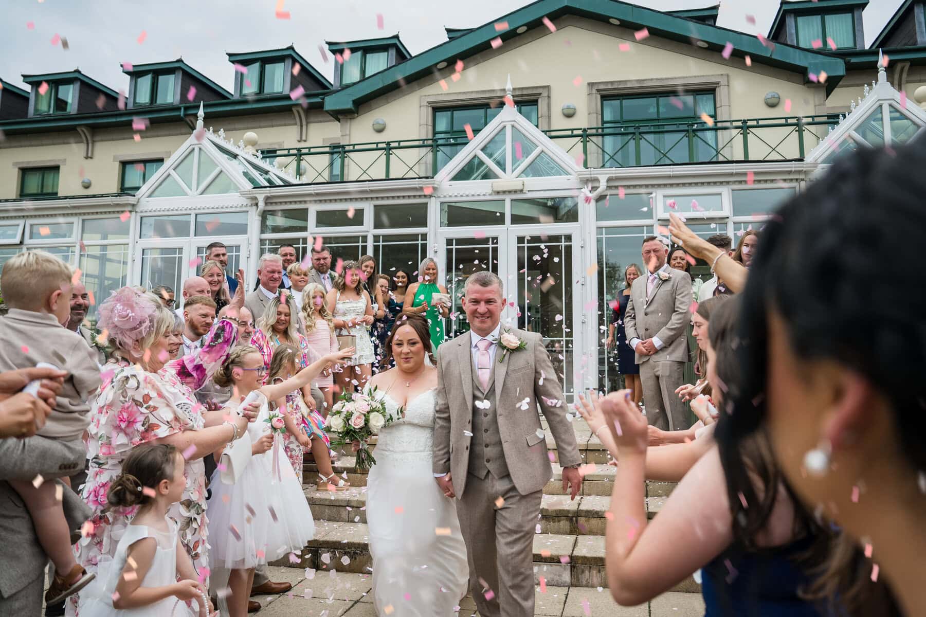 the vale resort hensol wedding photography, couple confetti shot