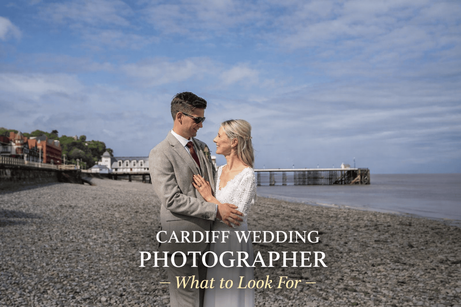 Choosing a Cardiff wedding photographer capturing a couple on Penarth Beach in South Wales